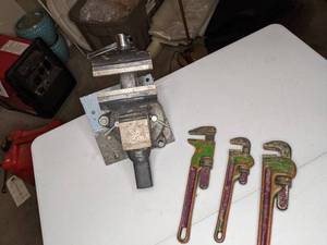 lot 214 image: Three Vintage Ridgid Pipe Wrenches and Bench Vice