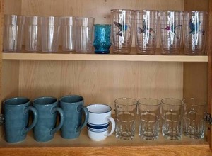 lot 240 image: Two Shelves Filled with Drinking Glasses