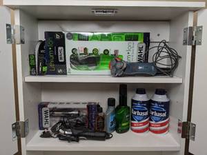 lot 257 image: Contents of Shelves Razors, Trimmers, Shaving Cream, After Shave