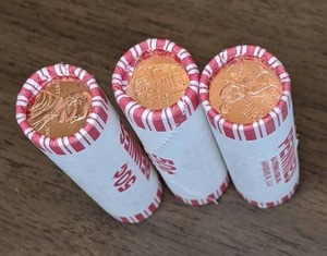 lot 261 image: Three Rolls of Lincoln Anniversary Pennies