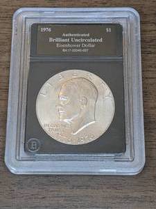 lot 123 image: 1976 Brilliant Uncirculated Eisenhower Bicentennial Dollar Coin