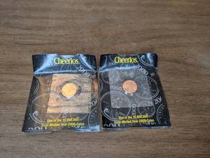 lot 127 image: Pair of 2000 Cheerios Lincoln Pennies in Original Packaging