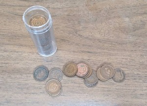lot 148 image: Two Containers Filled with Indian Head Pennies