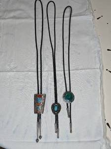 lot 107 image: Three Southwestern Bolo Ties