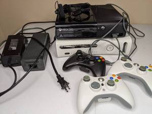 lot 161 image: Pair of Xbox 360s with Controllers