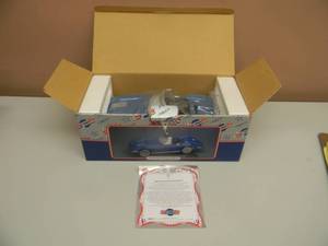 lot 47 image: ENESCO CERAMIC CHEVROLET 1963 CORVETTE COLLECTIBLE SAVINGS BANK - NEW IN BOX - WITH COA - SEE PICTURES