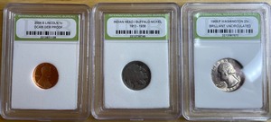 Three Different Encased Coins
