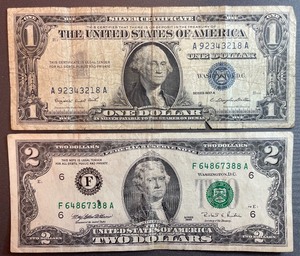 Two Different US Currency Bills $1 A 92343218 A, $2 F 64867388 A