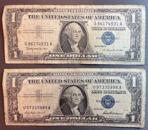 Two Different Silver Certificates $1 U 97335998 A, S 86174531 A