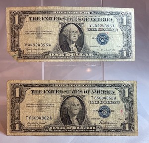 Two Different $1 Silver Certificates - T 66004862 A, V 44924396 A