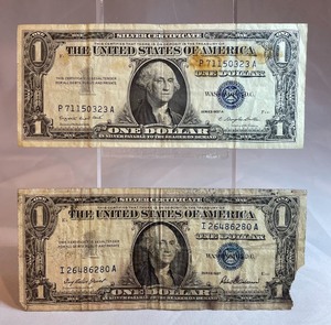 Two Silver Certificates - $1, P 71150323 A, I 26486280 A