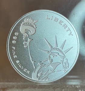 One Troy Ounce Silver Round -