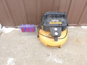 Bostich pancake air compressor. Turns on & makes a funny noise. For parts or repair. As shown.