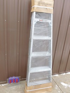 New 6 aluminum step ladder. As shown.