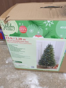 7.5 pre-lit pine Christmas tree. As shown.