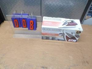 Black & Decker steam iron. Appears new in box. As shown.