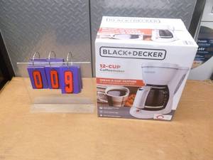 Black & Decker 12 cup coffee maker. Appears new in box. As shown.