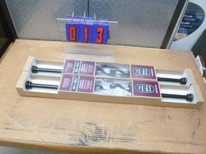Qty of 2 curtain rods. New in box. As shown.