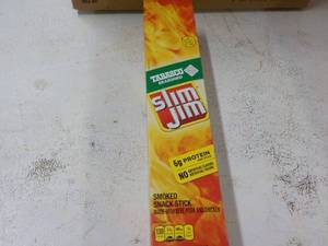 lot 31 image: Box of 24 .97 oz Slim Jims Tabasco...