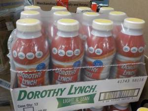 lot 56 image: Case of 12 Dorothy Lynch Lite dress...