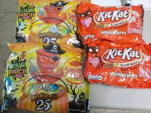 lot 59 image: 2 bags KitKats, 2 bags Swedish Fish...