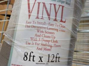 lot 125 image: 8x12 vinyl with damage to end as ...