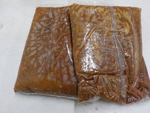 lot 233 image: 2 5 lb. bags frozen taco sauce with...