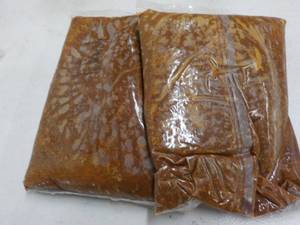 lot 234 image: 2 5 lb. bags frozen taco sauce with...