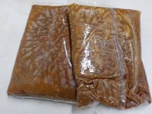 lot 235 image: 2 5 lb. bags frozen taco sauce with...