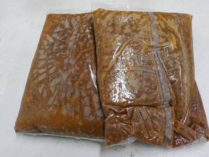 lot 240 image: 2 5 lb. bags frozen taco sauce with...