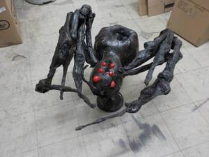 lot 287 image: Black giant spider with red eyes - ...