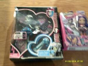 monster high doll and a shopkins sh...