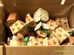box of christmas ornament hooks and...