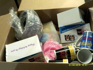 box of mugs , strainers, coffee gri...