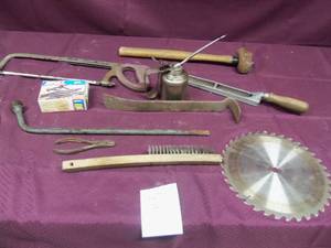 Assorted hand saws oil can sledge...