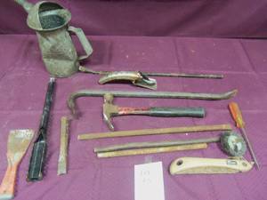Assorted tools and large oil can...
