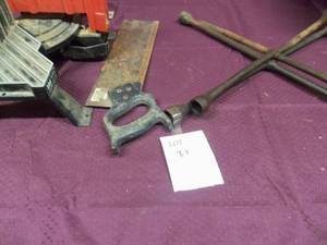 4 way tire Iron and power saw...