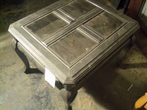 Gray end table with square glass to...