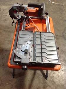 Ridgid 9 Amp Corded 7 in. Wet Tile Saw with Stand see pictures