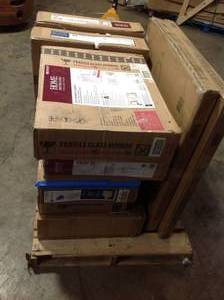 Pallet with assorted Bathroom mirrors and cabinets open box see pictures