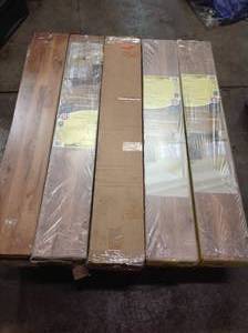 Pallet with 9 cases of Trafficmaster Ember Oak Laminate Flooring (24.24 Sq. Ft.  Case)  see pictures