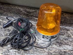 lot 28 image: Vintage Tripp-Lite MV-2 Amber Beacon Light