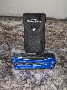 lot 26 image: ADVENTURIDGE 15 IN 1 Multi Tool Knife wCase, New