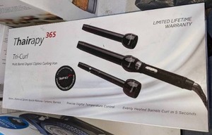lot 215 image: Thairapy 365 Tri Curl 3 in 1 Clipless Curling Iron