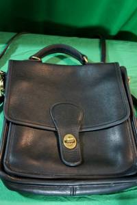 lot 33 image: Vintage Black Leather Crossbody Coach