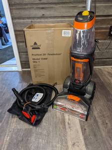 lot 318 image: Bissell ProHeat 2X Revolution Max Clean Pet Pro Full-Size Carpet Cleaner