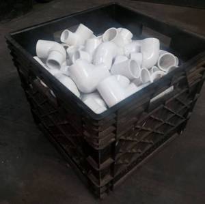 lot 22 image: Vintage National milk crate with pvc connectors