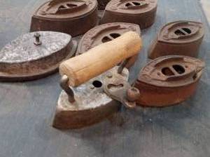 lot 30 image: Antique cast iron Irons