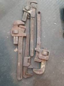 lot 19 image: 4 antique pipe wrenches