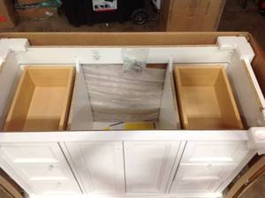 White Bathroom Vanity only 48 in x 22 in x 34 in see pictures